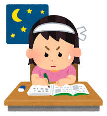 女性が英語を徹夜で勉強している